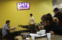 <p>The scene at a restaurant in L.A.’s Koreatown on Tuesday. (Photo: Mario Tama/Getty Images) </p>