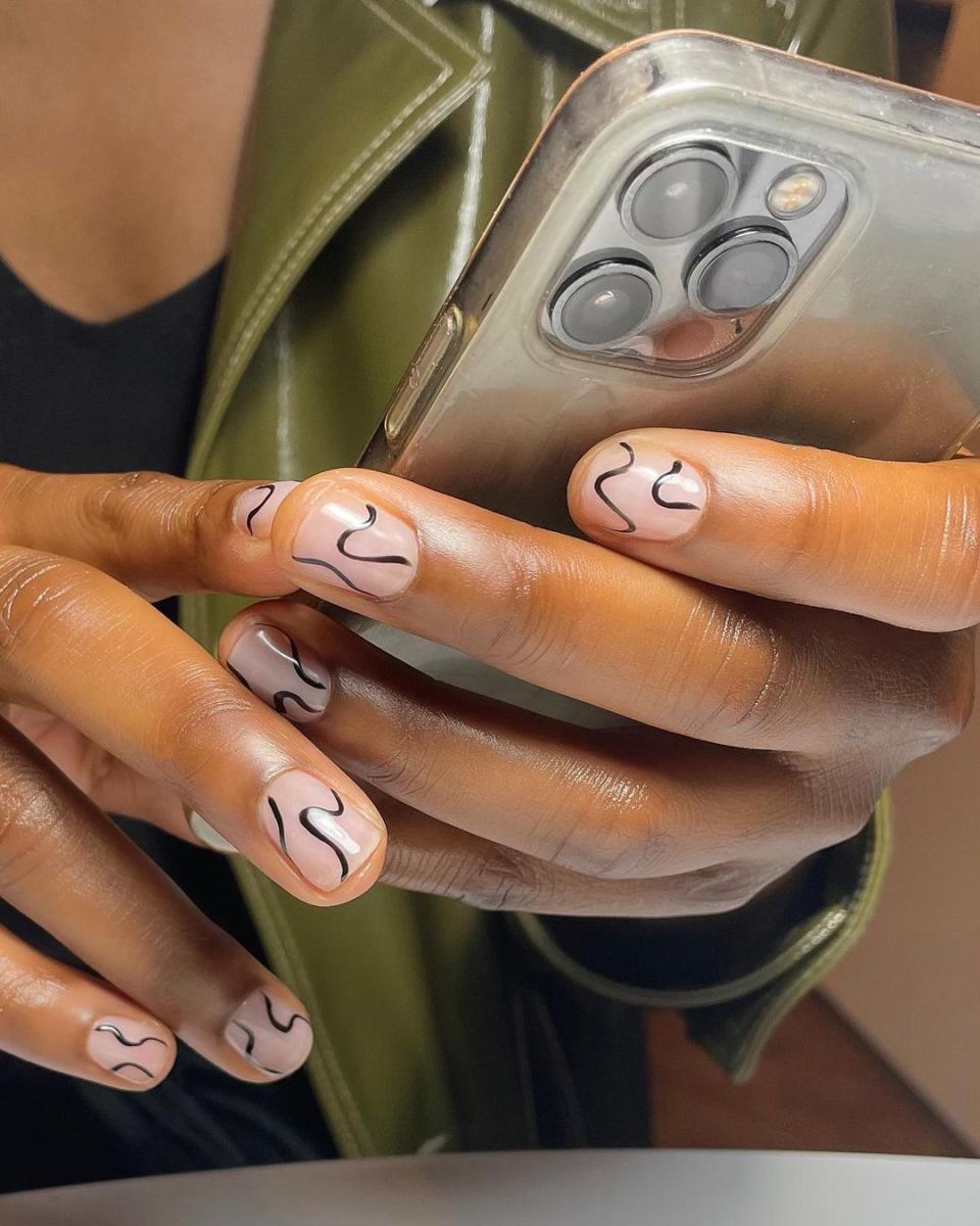 Freehand squiggles and not much else is so minimal and chic, especially when done in a neutral palette.