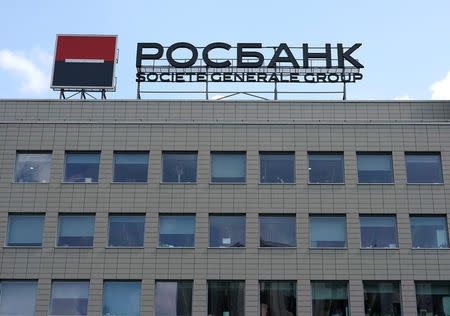 A view shows a board advertising Rosbank on the roof in a building in Moscow, Russia, July 4, 2016. Reuters/Maxim Zmeyev/Files