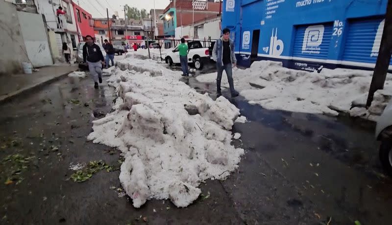 Hailstorm covers Mexican streets with thick ice amid heat wave