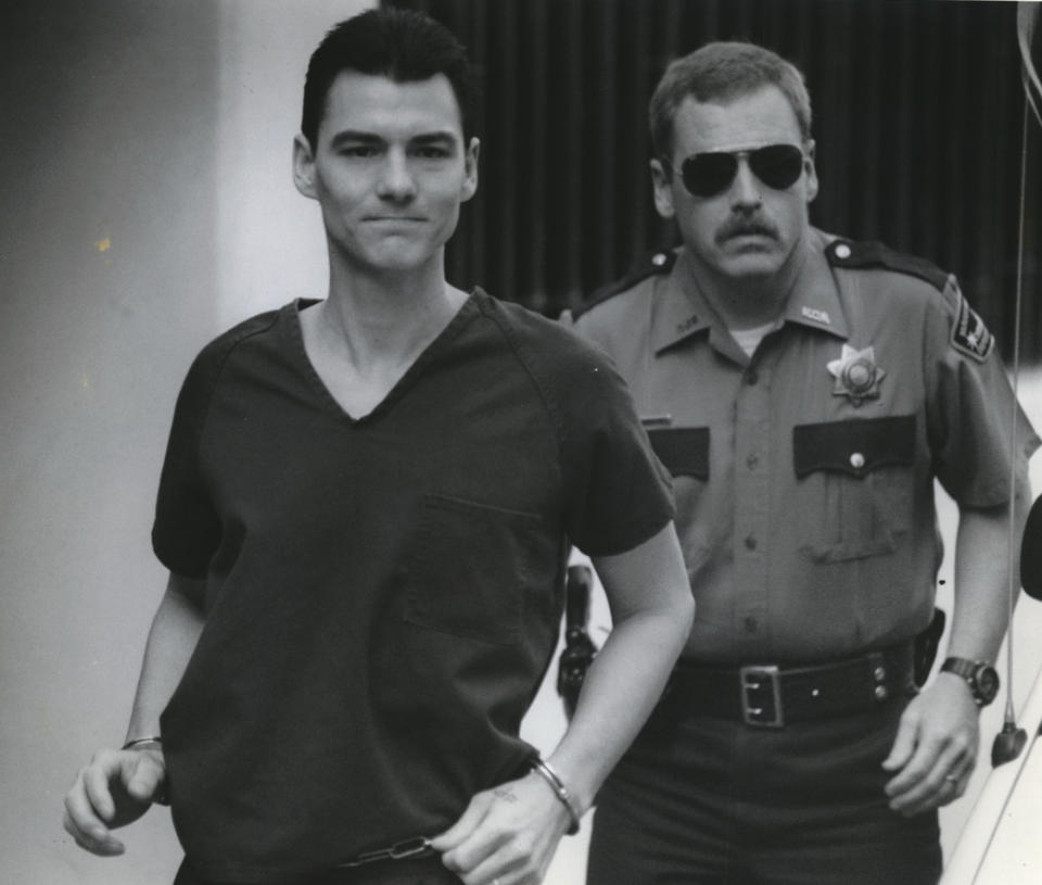 FILE - Frank Gable is escorted at the Marion County Courthouse in Salem, Ore., in 1990. Gable, who spent nearly three decades in prison for the 1989 killing of Oregon’s prisons director, has been granted his full freedom. U.S. Magistrate Judge John V. Acosta ordered the Marion County murder indictment against Gable be dismissed on Monday, May 8, 2023, and prohibited the state from retrying him in the death of Oregon prison chief Michael Francke, The Oregonian/OregonLive reported. (The Oregonian via AP)