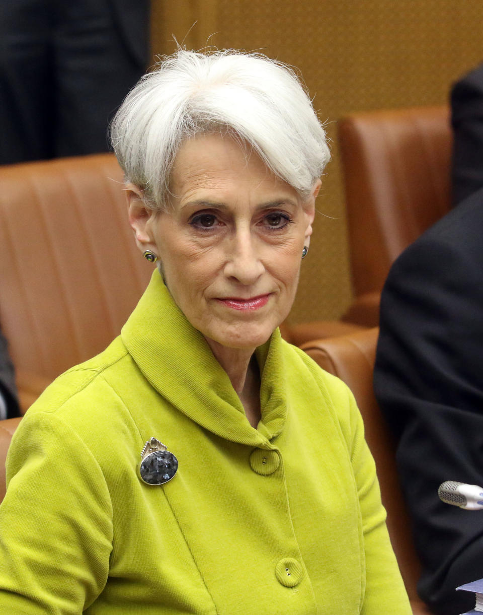 U.S. Undersecretary of State for Political Affairs Wendy Sherman waits for the start of closed-door nuclear talks in Vienna, Austria, Tuesday, March 18, 2014. Iran's foreign minister Mohamad Javad Zarif and the EU's top foreign policy chief Catherine Ashton have launched a new round of nuclear talks between Tehran and six world powers, putting a reported tiff behind them. The two sides hope to reach an agreement by July that trims Iran's nuclear activities in exchange for an end to sanctions choking Tehran's economy. (AP Photo/Ronald Zak)