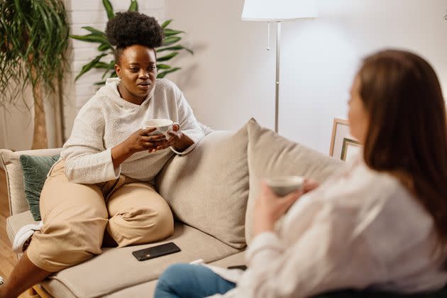 Active listening is key to helping someone when they're having a hard time with their mental health. (Photo: Anchiy via Getty Images)