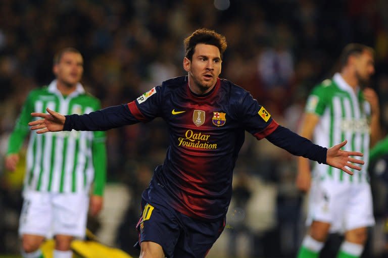 Lionel Messi celebrates after scoring during Barcelona's La Liga match against Real Betis on December 9. Messi insists that his record-breaking 86-goal haul in 2012 will count for nothing if Barcelona miss out on La Liga and Champions League titles