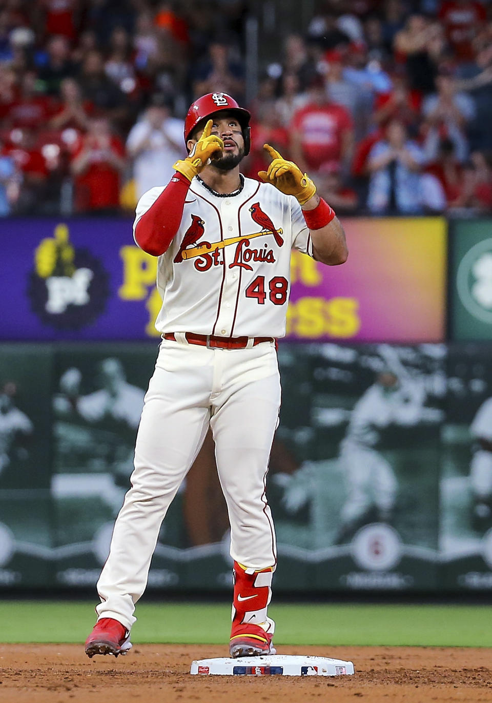 St. Louis Cardinals Ivan Herrera gestures after hitting a two-run double against the Cincinnati Reds during the first inning of a baseball game Saturday, Sept. 30, 2023, in St. Louis. (AP Photo/Scott Kane)