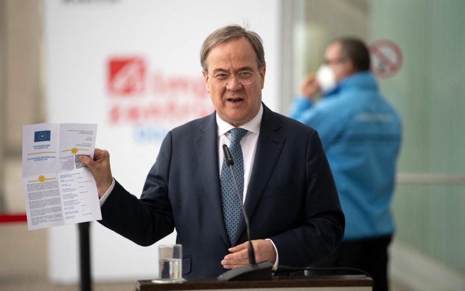 North Rhine-Westphalia's State Premier Armin Laschet gives a statement following a visit at a vaccination centre in Duesseldorf, western Germany, on May 26, 2021. (Photo by Federico Gambarini / POOL / AFP) (Photo by FEDERICO GAMBARINI/POOL/AFP via Getty Images) - FEDERICO GAMBARINI/AFP