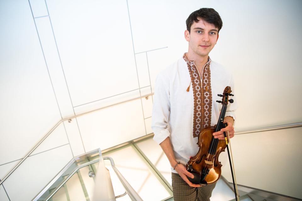 University of Tennessee violin performance student Marki Lukyniuk is photographed at the Natalie L. Haslam Music Center on campus on Thursday, Dec. 15, 2022. Marki, 22, arrived at UT from Ukraine in September to continue his studies while Ukraine continued to battle a war sparked by RussiaÕs February invasion.