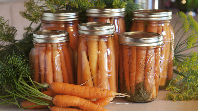 Pickled carrots in glass jars