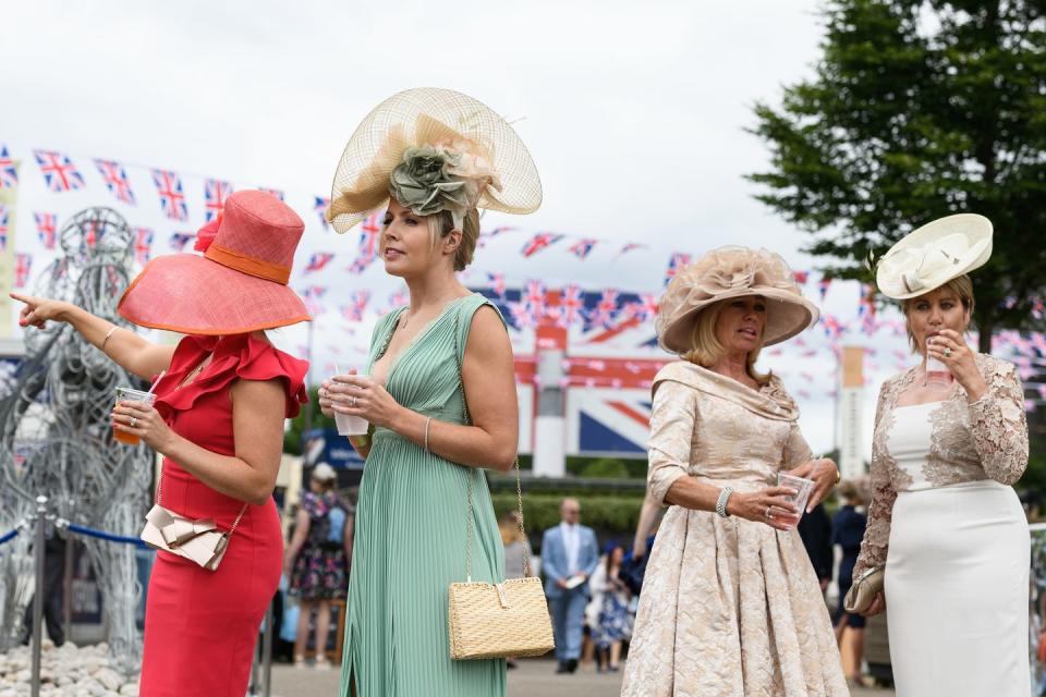 <p>Women enjoyed the festivities in various headgear.</p>