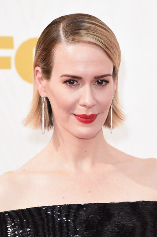 <p>Paulson made her bob extra glam by keeping it sleek with a deep side part. <i>(Photo: Getty Images)</i></p>