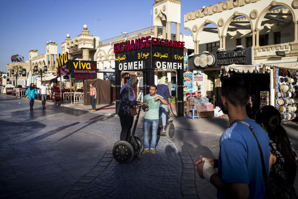 <div class="inline-image__caption"><p>Tourists stroll and segway along the main street of Nama Bay in Sharm El-Sheikh.</p></div> <div class="inline-image__credit">David Degner / Getty Images</div>