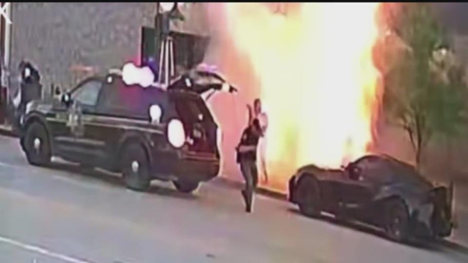 <div>Officer takes cover after propane tank explodes outside Rochester business.</div>
