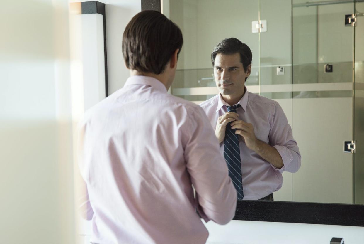 <span class="caption">People who think they are superior have no qualms about attacking those they regard as inferior. </span> <span class="attribution"><a class="link " href="https://www.gettyimages.com/detail/photo/man-looking-in-bathroom-mirror-adjusting-necktie-royalty-free-image/639549263" rel="nofollow noopener" target="_blank" data-ylk="slk:Sigrid Olsson/PhotoAlto Agency RF Collections via Getty Images;elm:context_link;itc:0;sec:content-canvas">Sigrid Olsson/PhotoAlto Agency RF Collections via Getty Images</a></span>