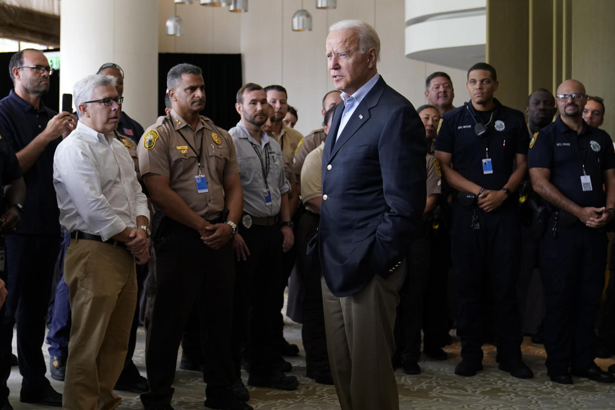 President Biden meets with first responders who were working on the condo tower that collapsed in Surfside, Fla., Thursday. (AP Photo/Susan Walsh)