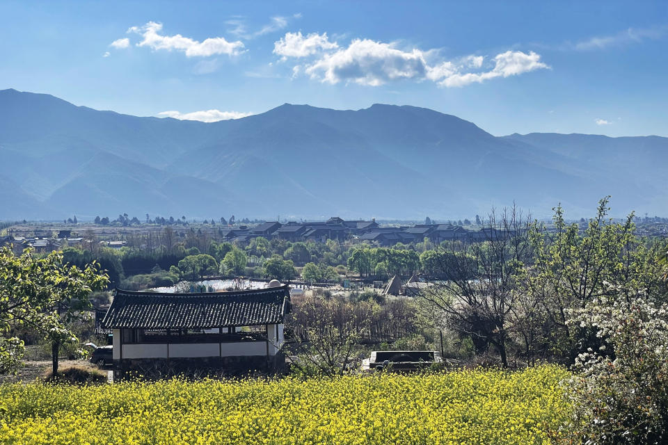 View of Club Med Lijiang juxtaposed with the towering mountains during the morning walk. (Photo: Lim Yian Lu)