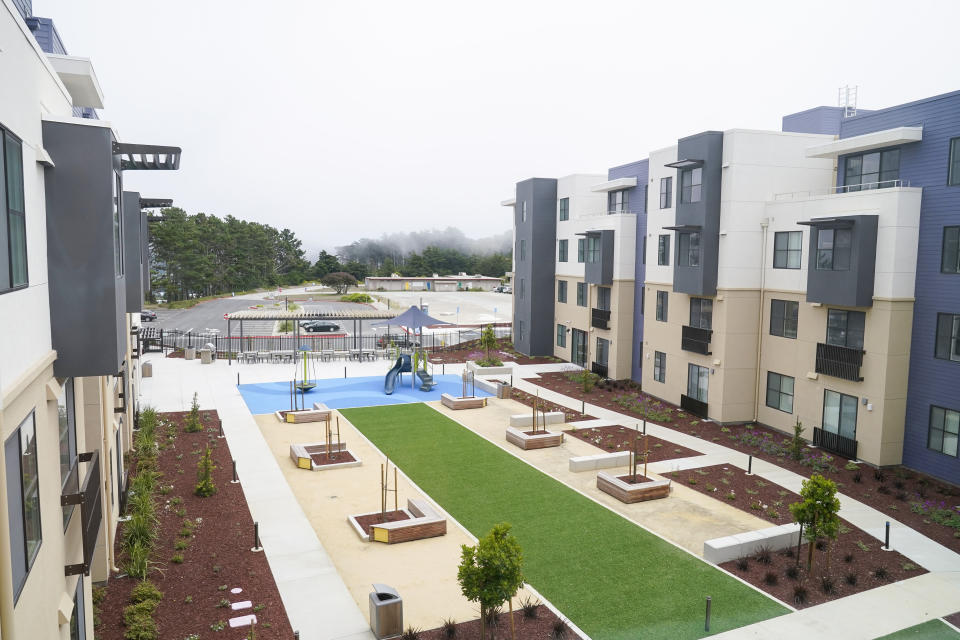 A view from the third floor of the courtyard, of a new housing complex for Jefferson Union High School District teachers and education staff, in Daly City, Calif., Friday, July 8, 2022. The school district in San Mateo County is among just a handful of places in the country with educator housing. But with a national teacher shortage and rapidly rising rents, the working class district could serve as a harbinger as schools across the U.S. seek to attract and retain educators. (AP Photo/Godofredo A. Vásquez)