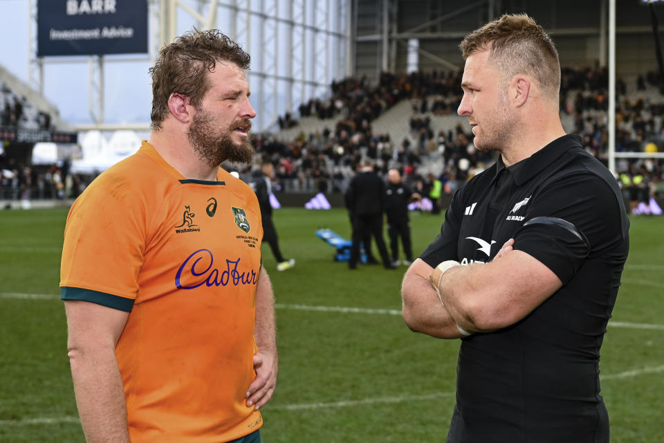 Australia's James Slipper, left, and New Zealand's Sam Cane talk following the Bledisloe Cup rugby test match between the All Blacks and Australia in Dunedin, New Zealand, Saturday, Aug. 5, 2023. (John Davidson/Photosport via AP)