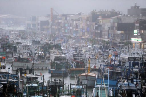 Fishing boats are moored in a shelter at Nanfangao harbor in eastern Ilan county, as typhoon Saola approches Taiwan's east coast on August 2, 2012. Saola -- the first typhoon to hit the island this year -- triggered heavy rains especially in the north and east and touched off widespread mudslides, forcing the authorities to evacuate more than 1,500 people islandwide