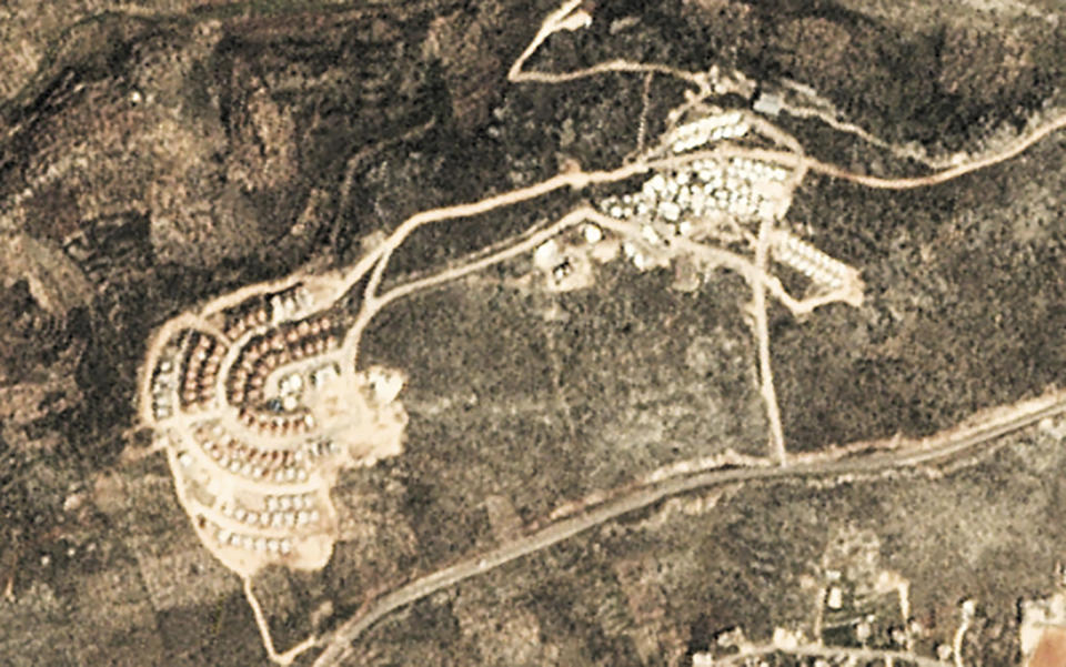This satellite image provided by Planet Labs Inc. shows the West Bank Jewish settlement of Bruchin on March 6, 2017. Satellite photos and data obtained by the AP document for the first time the full impact of the pro-settlement policies of then-President Donald Trump. (Planet Labs Inc. via AP)