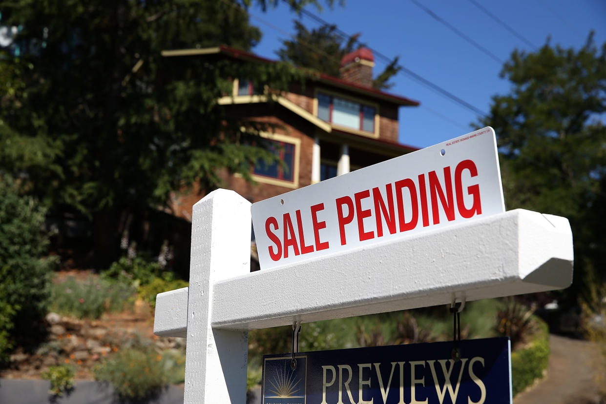 SAN ANSELMO, CA - MAY 22:  A sale pending sign is posted in front of a home for sale on May 22, 2013 in San Anselmo, California.  According to a report by the National Association of Realtors, sales of existing homes inched up 0.6% to a seasonally adjusted annual rate of 4.97 million, up from 4.94 million in March, the highest level since 2009.  (Photo by Justin Sullivan/Getty Images)