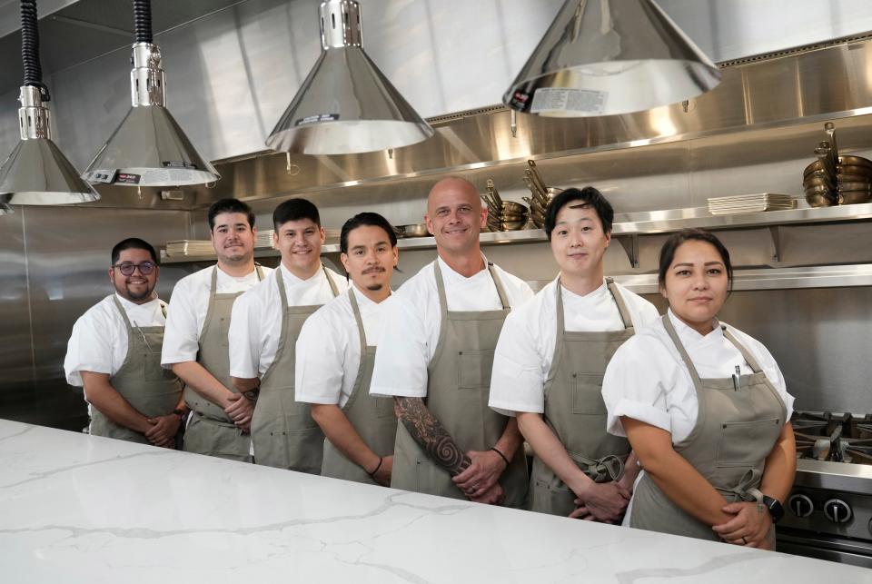 Cory Oppold (third from right) poses with his crew at Course, a new multicourse restaurant in Scottsdale.
