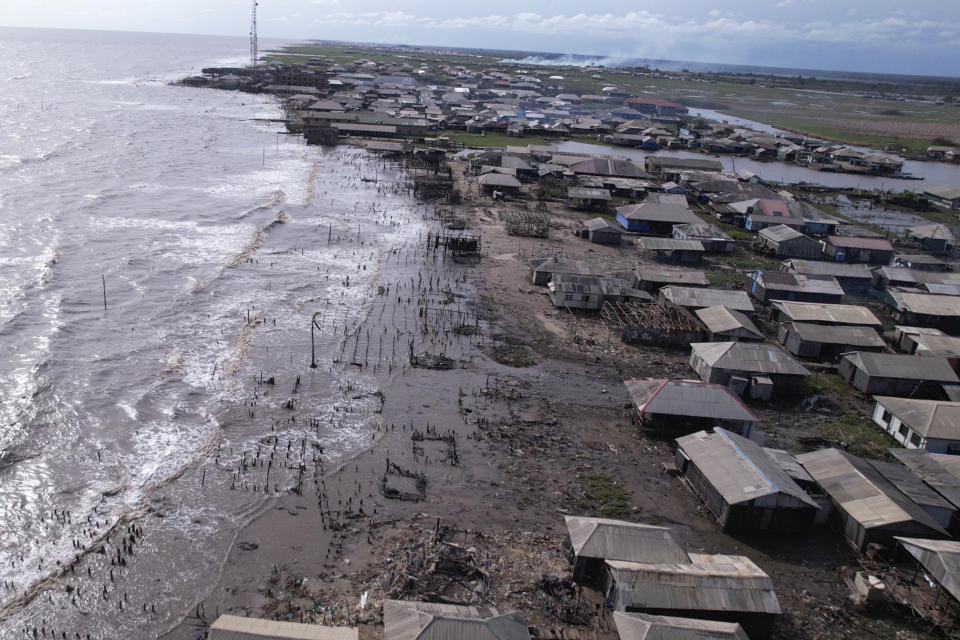 In this screen grab taken from a drone video, a view of the coastal erosion in Ayetoro, Southwest Nigeria, Friday, April 5, 2024. Ayetoro, a coastal community more than 200 km southeast of Nigeria's business capital Lagos, has been experiencing coastal erosion for many years. But the changes have recently rapidly worsened with the community slumping into the Atlantic Ocean, leading to repeated displacements of households and businesses. (AP Photo/Dan Ikpoyi)