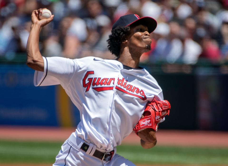 Cleveland Guardians starting pitcher Triston McKenzie delivers against the New York Yankees during the first inning of a baseball game in Cleveland, Sunday, July 3, 2022. (AP Photo/Phil Long)