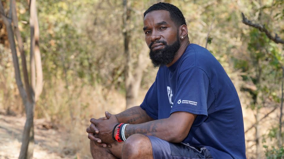 Mental health advocate Kevin Berthia, who has survived his own suicide attempts, poses in 2021 in Sacramento, California. - Rich Pedroncelli/AP