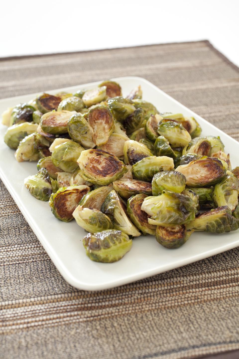 This undated photo provided by America's Test Kitchen in November 2018 shows roasted Brussels sprouts in Brookline, Mass. This recipe appears in the cookbook "Complete Make-Ahead." (Carl Tremblay/America's Test Kitchen via AP)