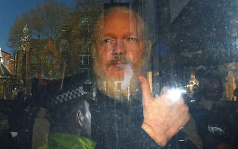 Julian Assange on his way to Westminster Magistrates Court