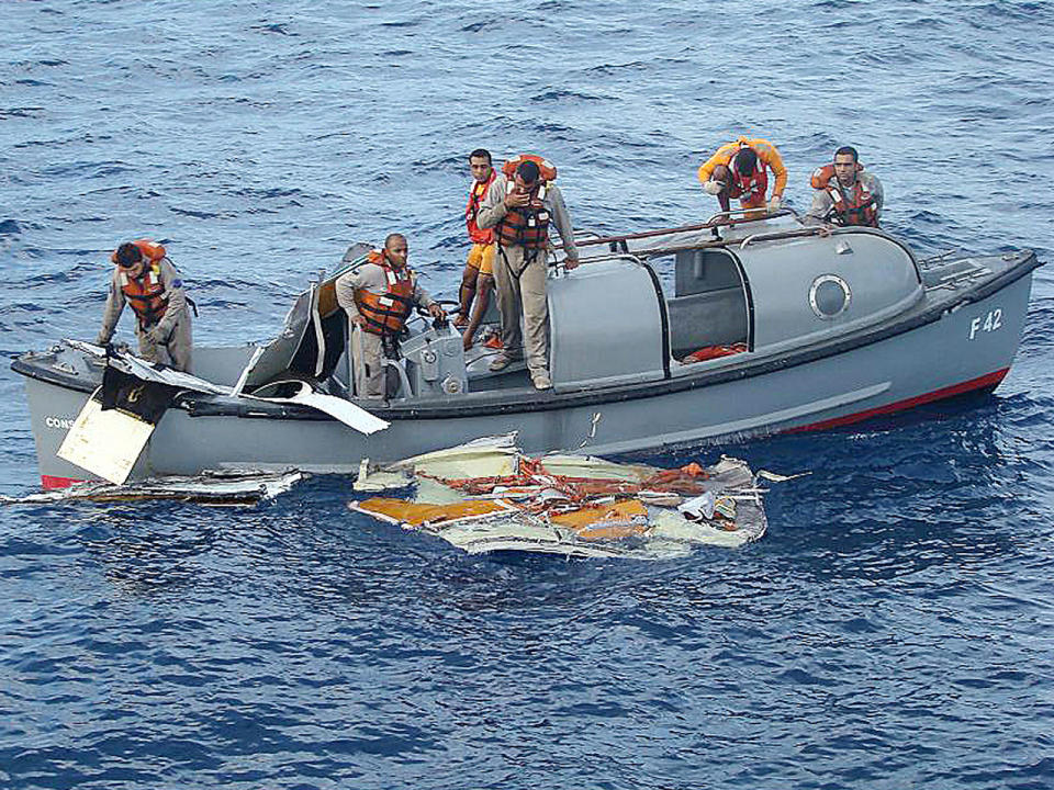 A handout picture from the Brazilian Navy press office shows crew members of the Brazilian Frigate 