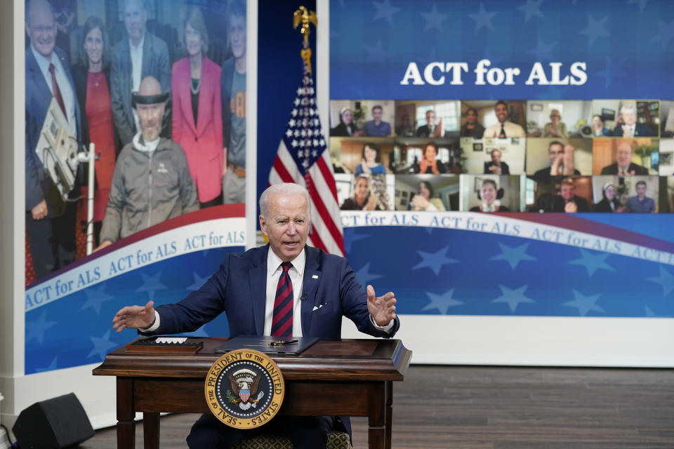 President Joe Biden speaks after signing the "Accelerating Access to Critical Therapies for ALS Act" into law during a ceremony in the South Court Auditorium on the White House campus in Washington, Thursday, Dec. 23, 2021. (AP Photo/Patrick Semansky)