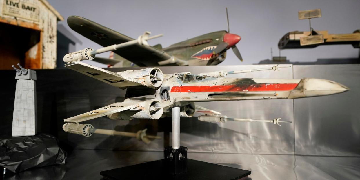 A miniature model called "Red Leader", a X-wing starfighter from the 1977 film, Star War, Episode IV, A New Hope, sits on display at Heritage Auctions, Thursday, Aug. 30, 2023, in Irving, Texas.