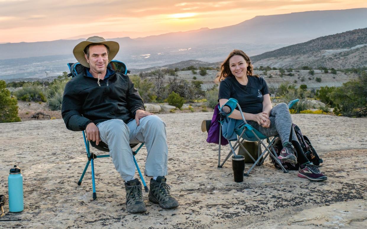 Christie Matherne and Robby Silk sitting at sunrise - Joshua Hall