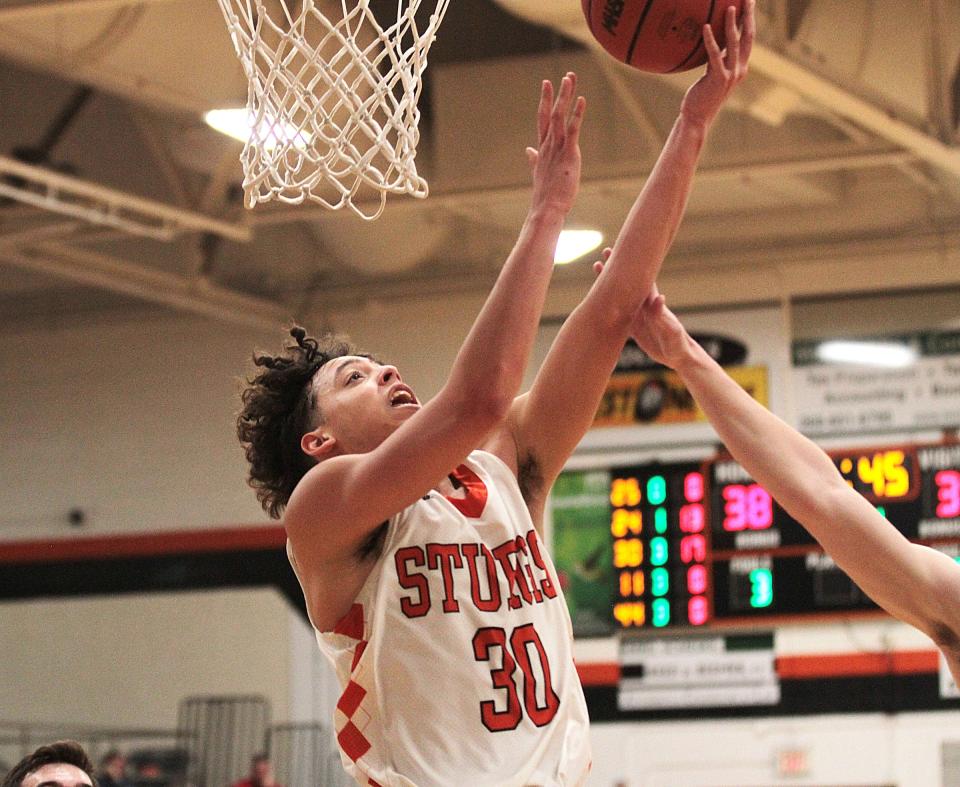 JJ Stevens scores two points for Sturgis on a reverse layup against Edwardsburg this past season.