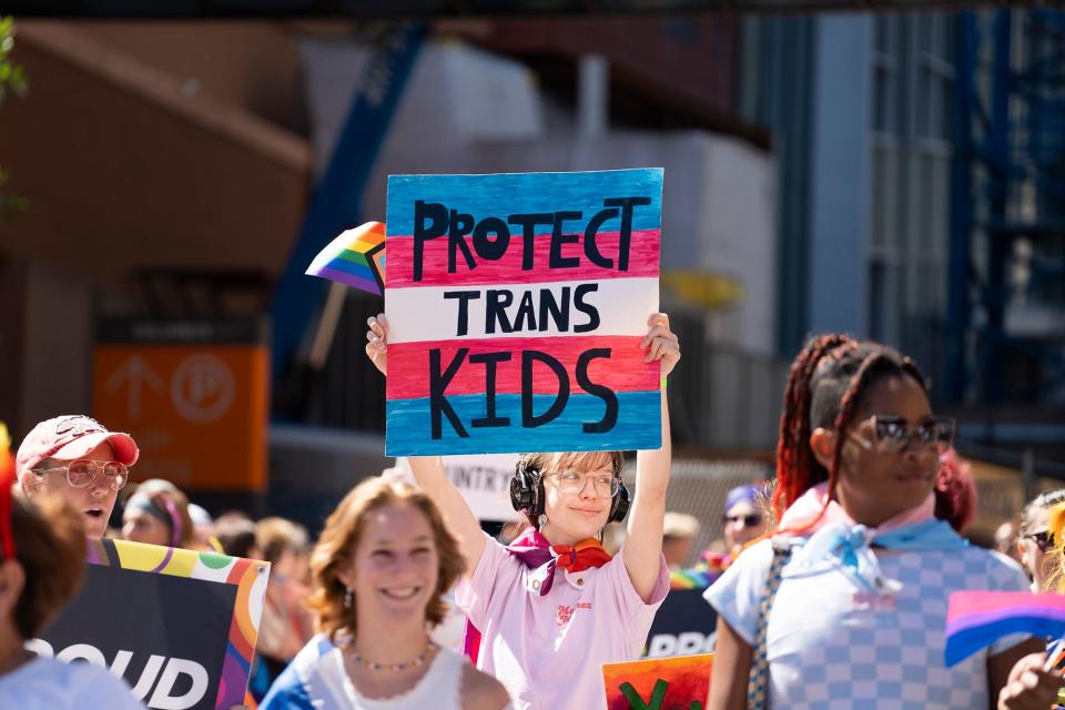 A trans rights group marches in the pride parade. Saturday, June 18, 2022, in Columbus. Thousands turned out for Stonewall Columbus' Pride parade Downtown. It was the first in-person event since 2019 and a welcome sight for many.
(Credit: Courtney Hergesheimer/ Columbus Dispatch)