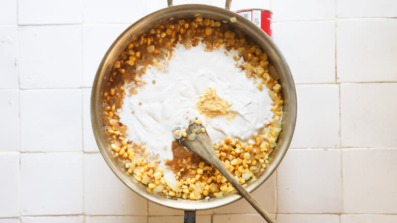 Cream in sauteed corn