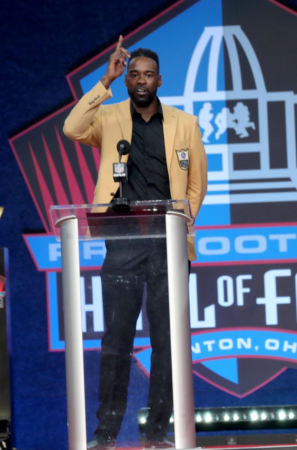 Former Detroit Lion Calvin Johnson gives his speech during the Pro Football Hall of Fame enshrinement ceremony Sunday, Aug. 8, 2021 at Tom Benson Hall of Fame Stadium in Canton, Ohio.