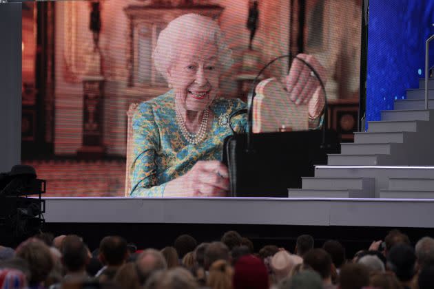 The late Queen having tea with Paddington during the Platinum Party at the Palace. (Photo: Victoria Jones - PA Images via Getty Images)