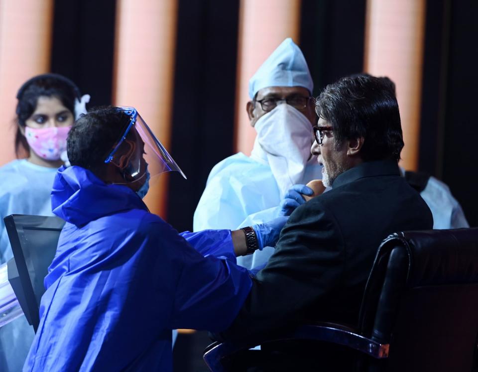 KBC Season 12 Staff in PPE gear, masks and face shields.