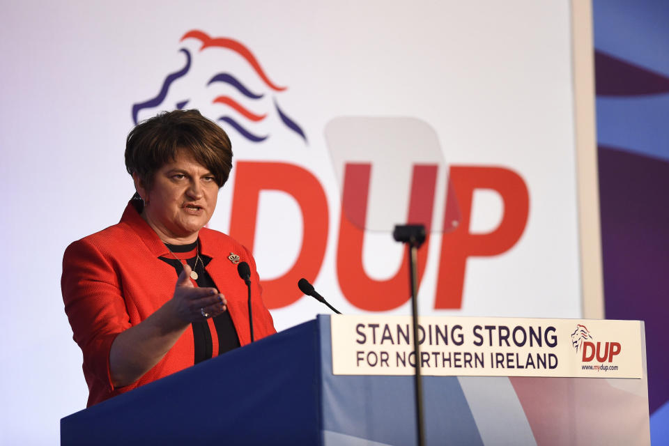 Party leader Arlene Foster speaking during the DUP annual conference at the Crown Plaza Hotel in Belfast, Saturday, Nov. 24, 2018. The leader of Northern Ireland's Democratic Unionist Party has used her keynote speech at the annual conference to reject the British government's planned Brexit deal. Arlene Foster said in Belfast on Saturday that the deal agreed by Prime Minister Theresa May is unacceptable and must be improved upon in the weeks ahead. (Michael Cooper/PA via AP)