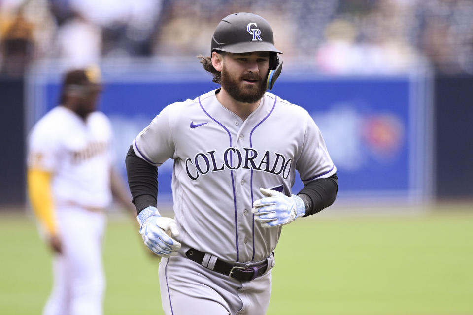 Colorado Rockies' Brendan Rodgers (7) rounds the bases after hitting a solo home run during the first inning of a baseball game against the San Diego Padres, Wednesday, Sept. 20, 2023, in San Diego. (AP Photo/Denis Poroy)