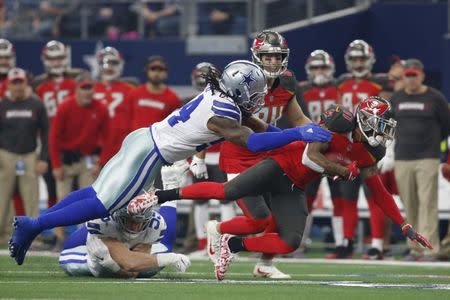 FILE PHOTO: Dec 23, 2018; Arlington, TX, USA; Tampa Bay Buccaneers wide receiver DeSean Jackson (11) runs against Dallas Cowboys middle linebacker Jaylon Smith (54) and outside linebacker Leighton Vander Esch (55) in the first quarter at AT&T Stadium. Mandatory Credit: Tim Heitman-USA TODAY Sports