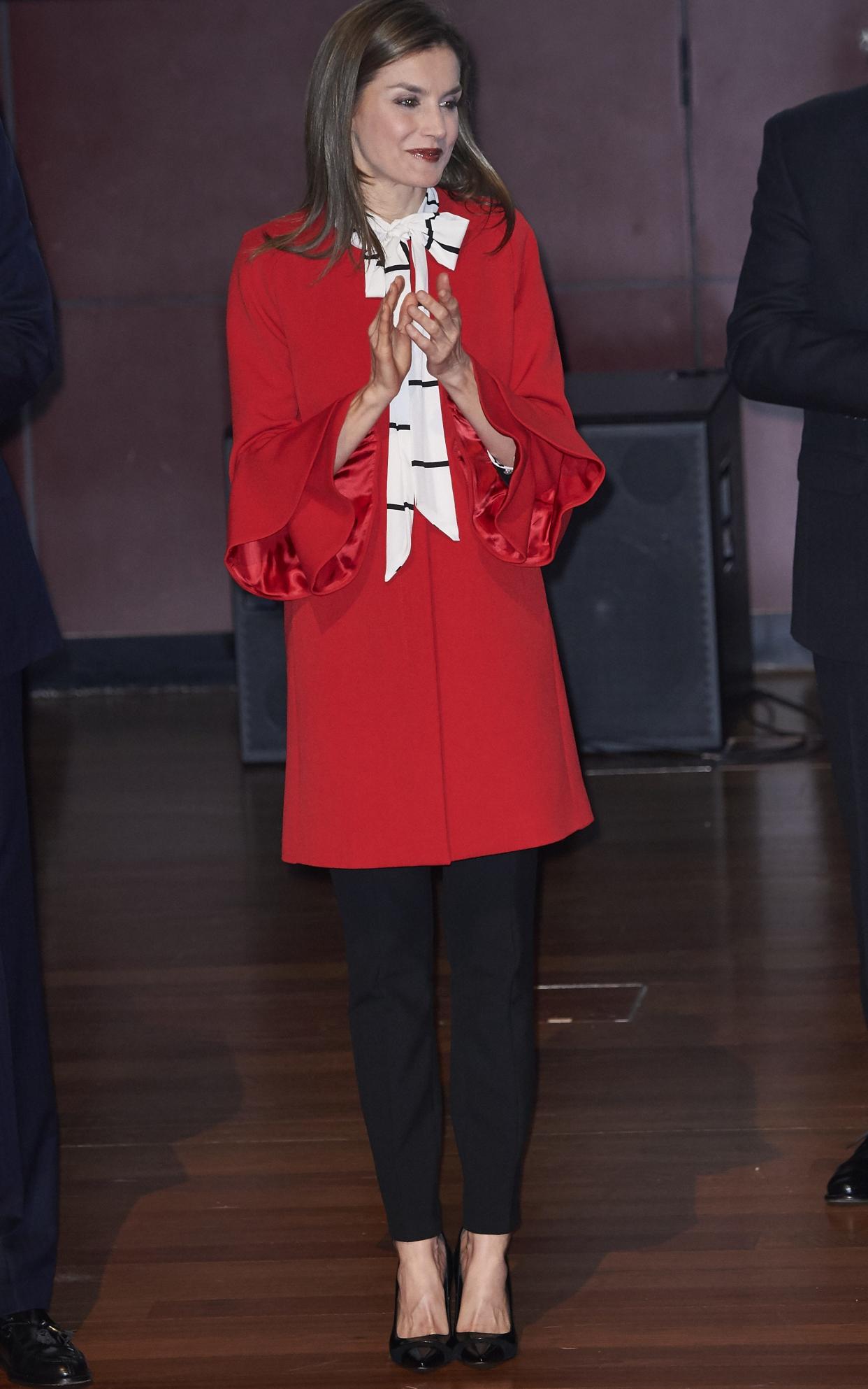 Queen Letizia of Spain wore a pussy-bow blouse and crimson coat for a ceremony in Madrid - Copyright (c) 2017 Rex Features. No use without permission.