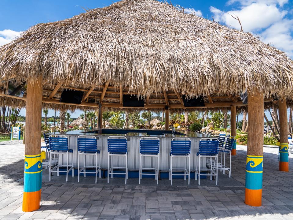 The empty tiki bar during the day.