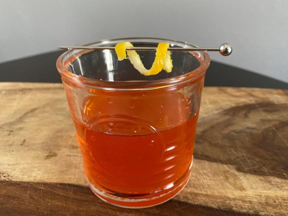 Rachel Ray negroni with lemon peel.