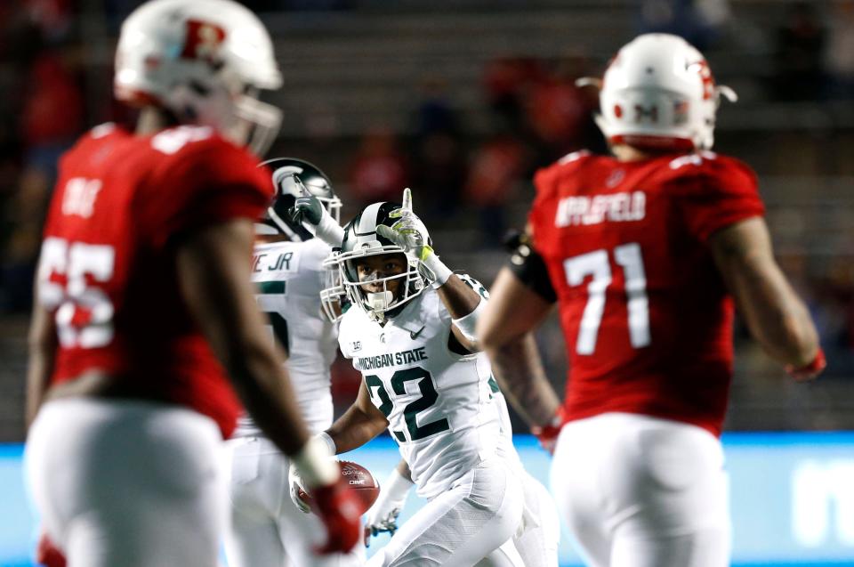 Nov 25, 2017; Piscataway, NJ, USA; Michigan State Spartans cornerback Josiah Scott (22) celebrates after an interception against Rutgers Scarlet Knights during second half at High Point Solutions Stadium.