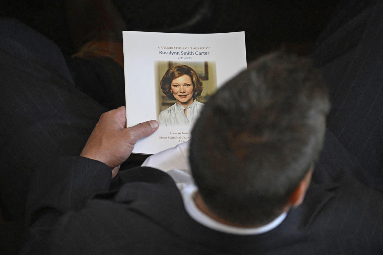 An attendee holds a program prior to a tribute service for former first lady Rosalynn Carter at Glenn Memorial Church in Atlanta on Nov. 28, 2023. (Andrew Caballero-Reynolds / AFP - Getty Images)