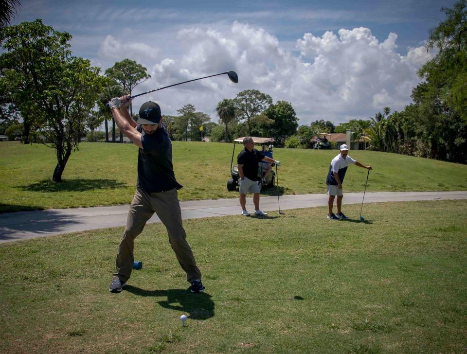 Louis Bautko, 26, tees off on the first hole at Lone Pine Golf Club in Riviera Beach on Sunday, April 16, 2023, the last day the course was open.