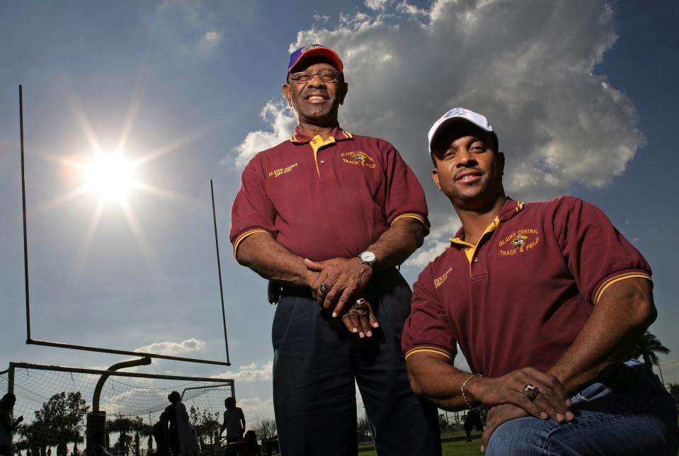 Willie McDonald with his son Ray McDonald, Sr. on the Glades Central High School football field. Willie played at Bethune and is a longtime track coach at Glades Central, Ray Sr. played for Florida and made the cover of Sports Illustrated in the '80s. Ray Jr. played for Florida in the 2006 BCS National Championship Game.